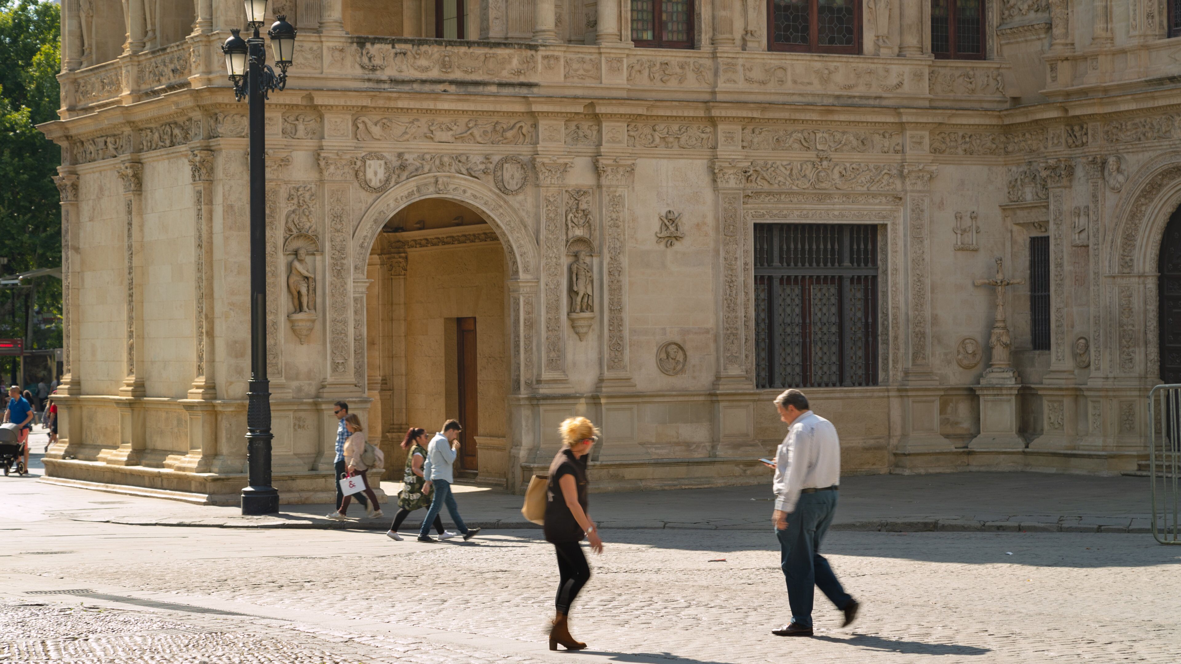 Seville Town Hall showing street scenes and heritage elements as well as a couple