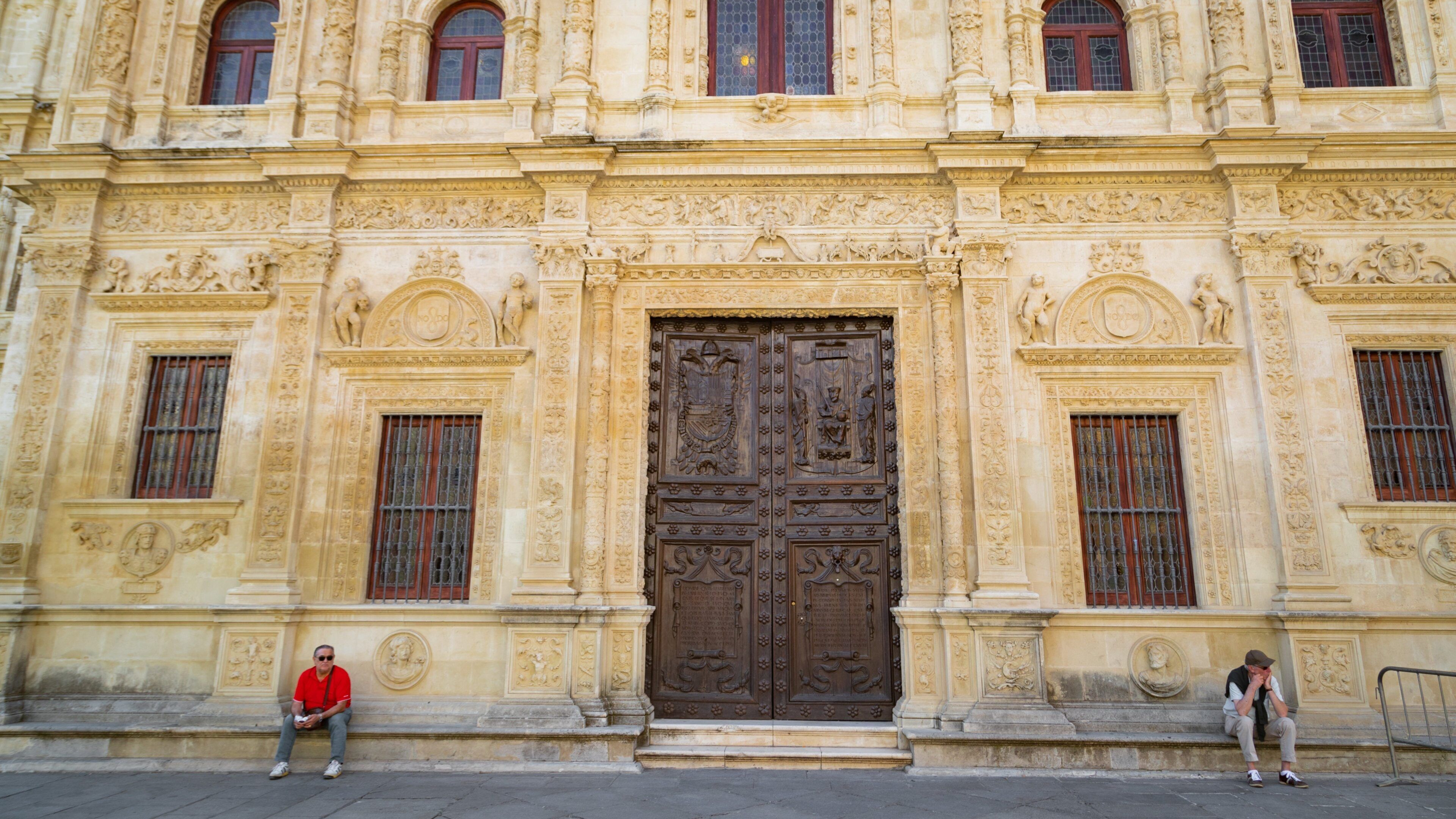 Seville Town Hall which includes heritage elements as well as an individual male
