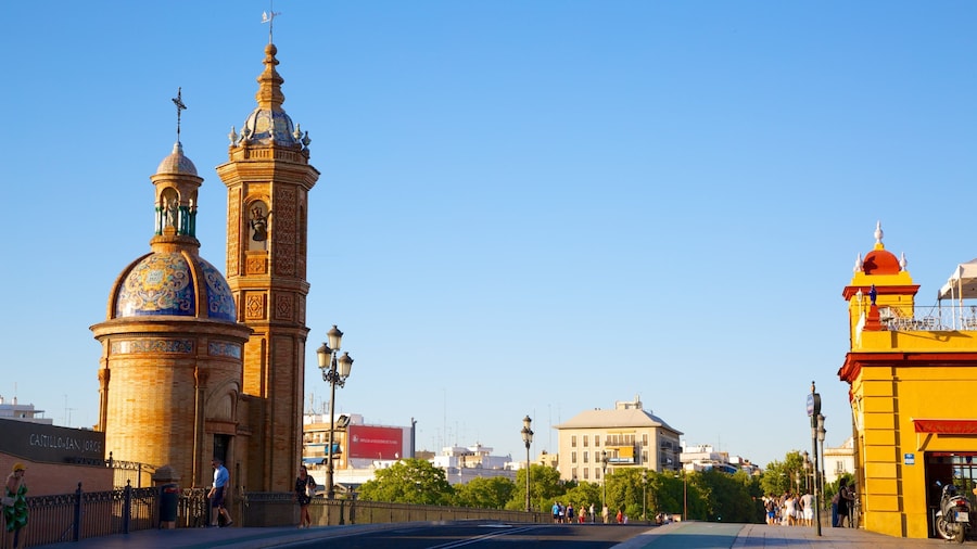 Triana Bridge featuring heritage architecture, a bridge and street scenes