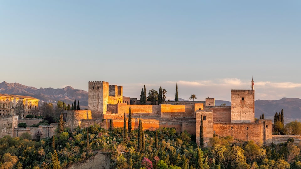 Alhambra fortress palace in Granada Spain at sunset