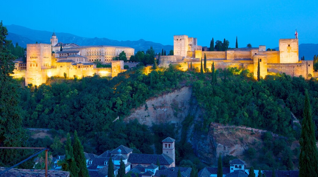 Mirador de San Nicolas featuring a castle, a gorge or canyon and heritage architecture