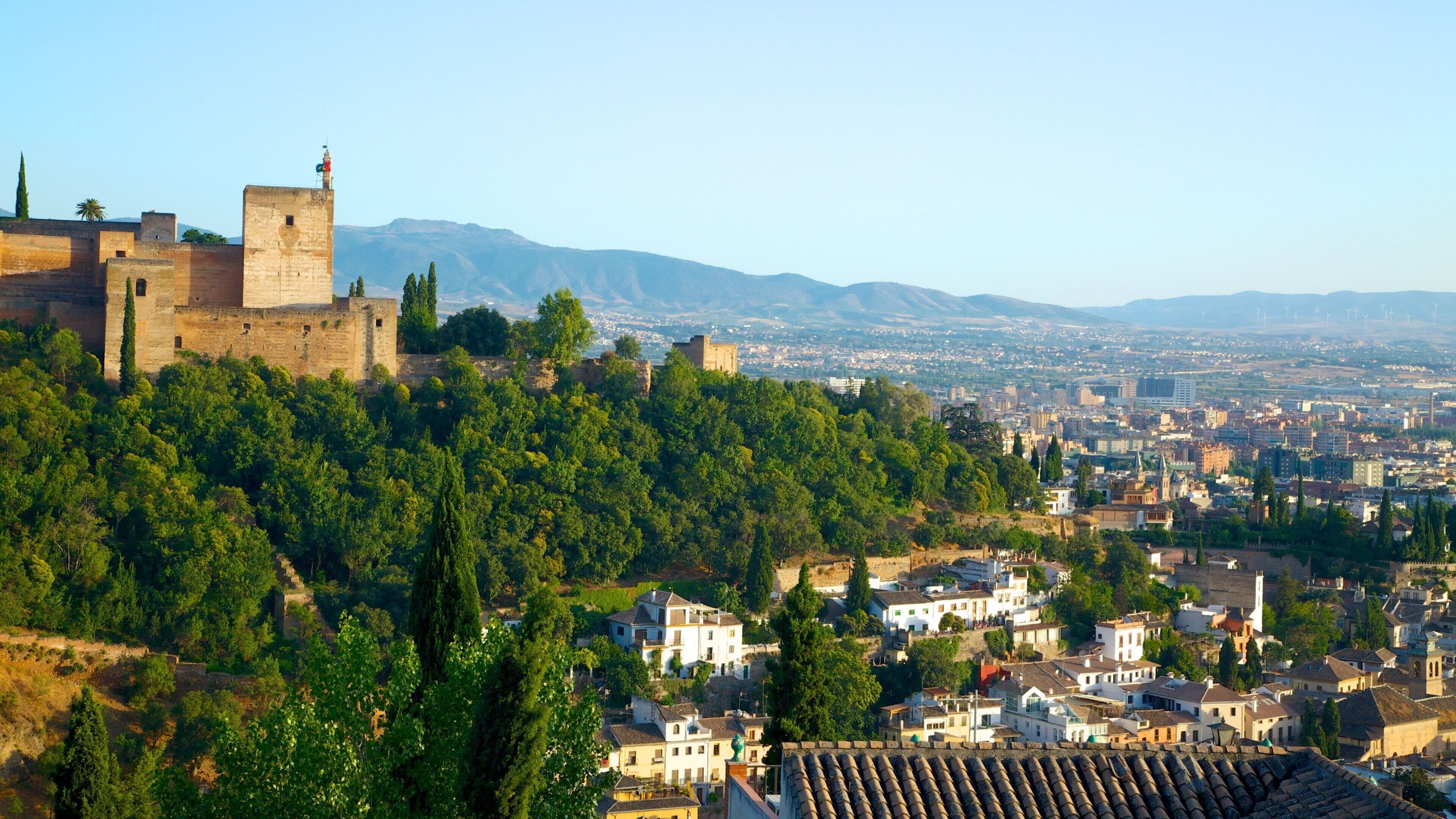Mirador de San Nicolas showing a city, landscape views and château or palace