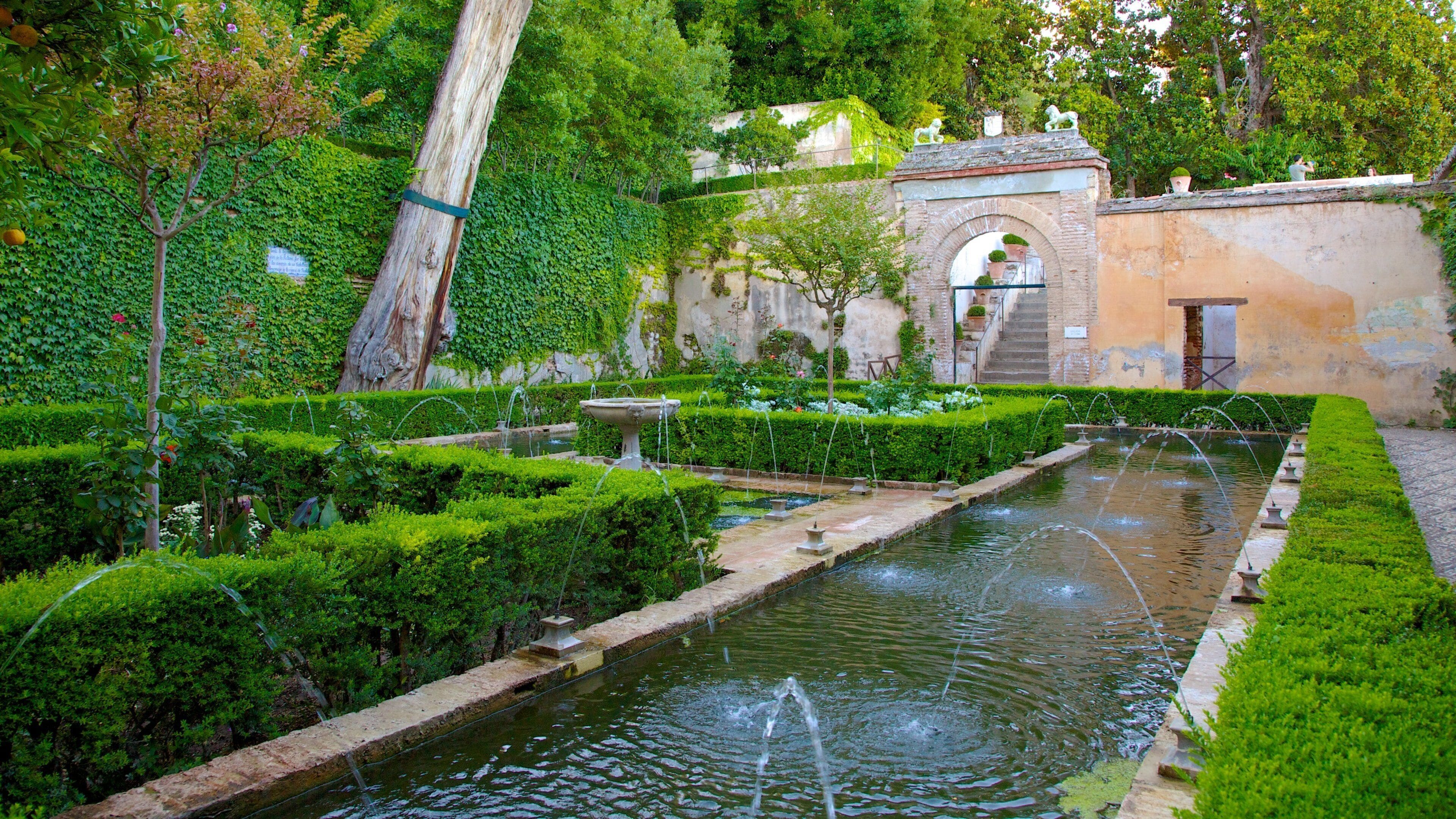 Generalife featuring a fountain, chateau or palace and a garden