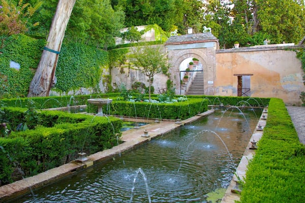 Generalife featuring a fountain, chateau or palace and a garden