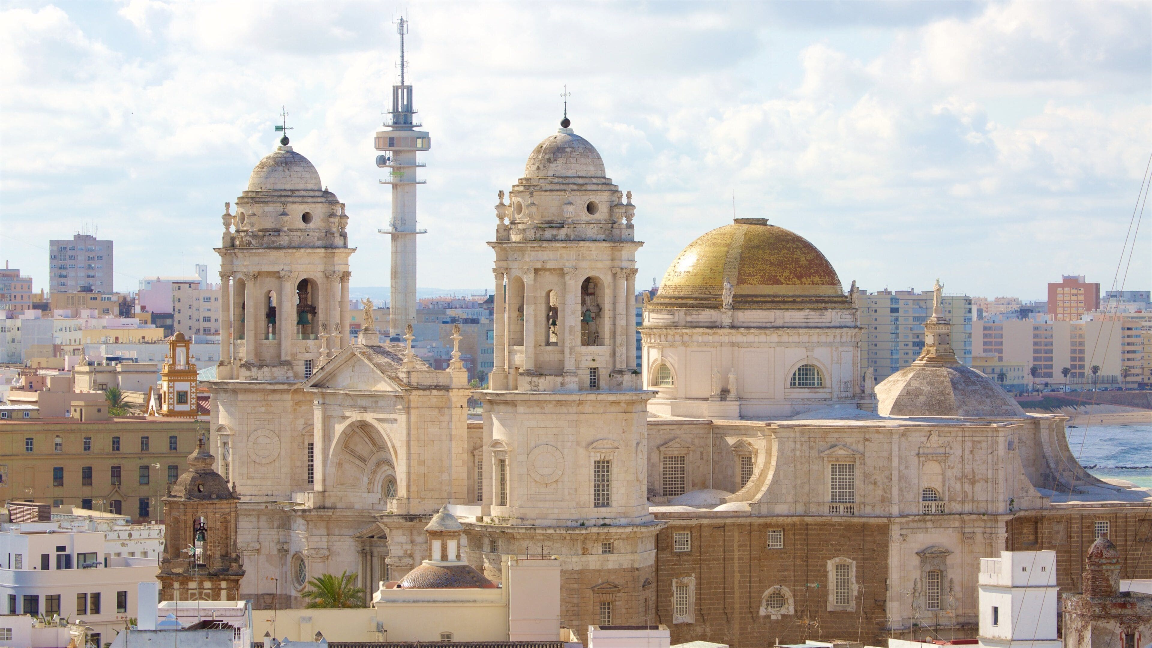 A historic cathedral with two bell towers and a large dome.