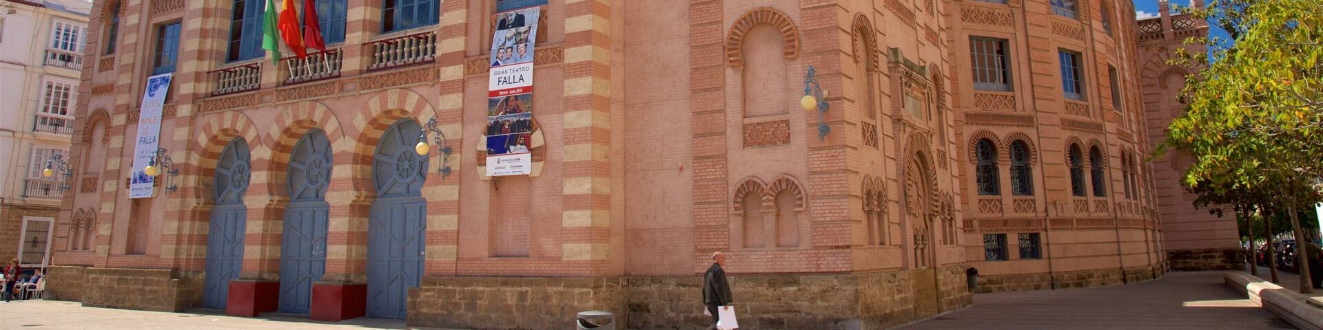 A historic building with arched windows and intricate brickwork, labeled "GRAN TEATRO FALLA".