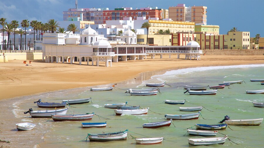 La Caleta Beach showing a coastal town, a beach and boating