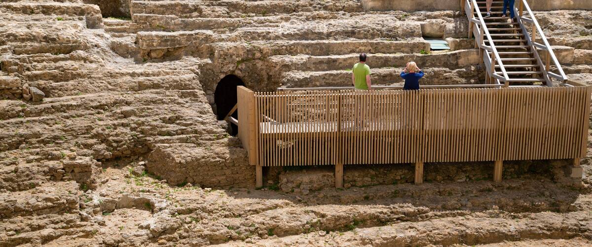 Roman Theater which includes heritage elements as well as a small group of people