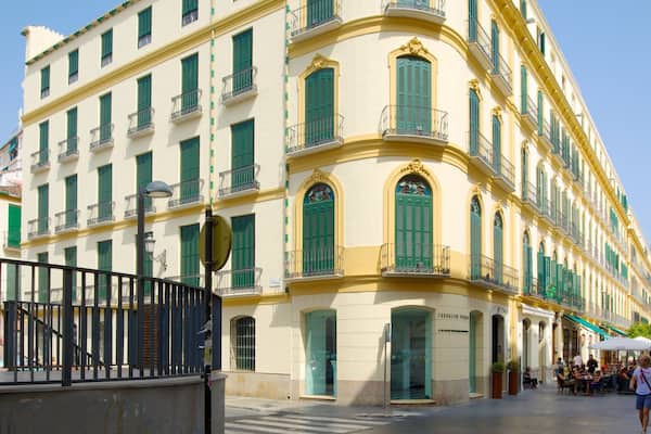 Picasso\'s Birthplace showing a city and street scenes