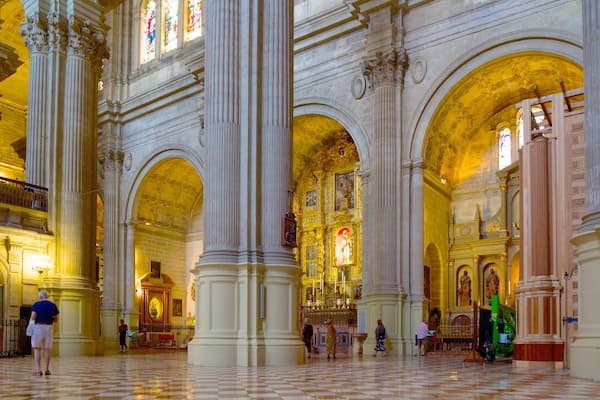 Malaga Cathedral featuring religious elements, a church or cathedral and interior views