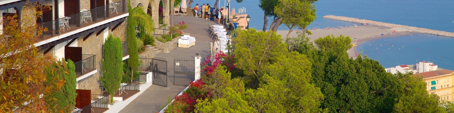 Gibralfaro Castle featuring heritage architecture, a coastal town and a bay or harbor
