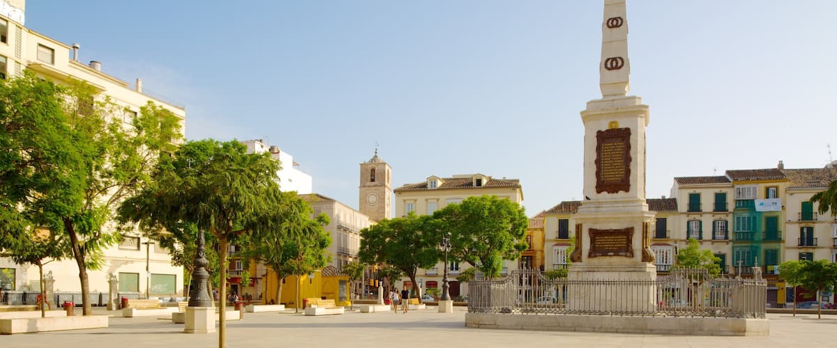 Plaza de la Merced featuring a city, heritage architecture and outdoor art