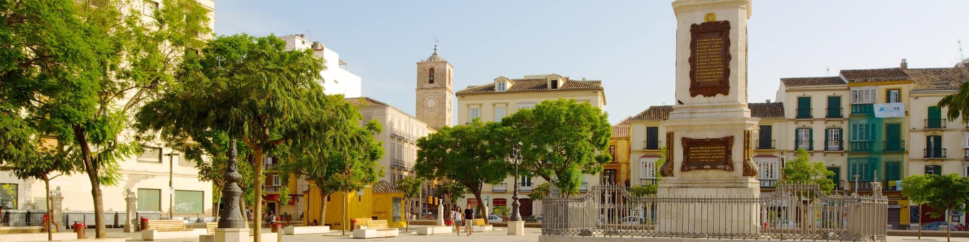 Plaza de la Merced featuring a city, heritage architecture and outdoor art