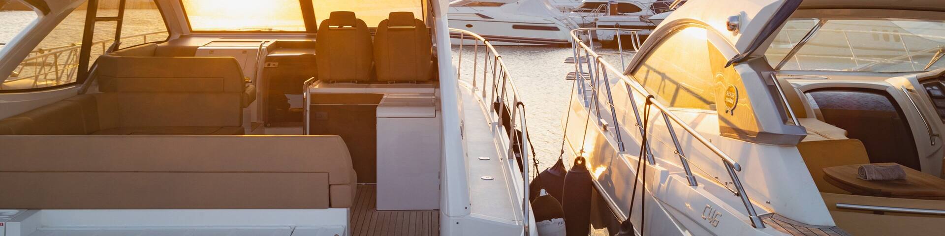 Puerto Banus Marina featuring a sunset and a bay or harbor