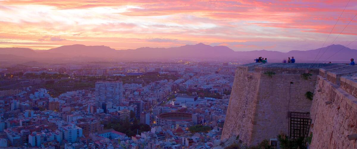 Castle of Santa Barbara featuring a city, landscape views and château or palace