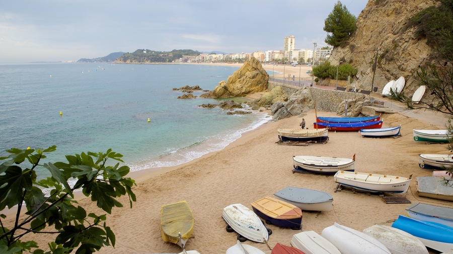 Lloret de Mar Beach featuring boating, a beach and landscape views