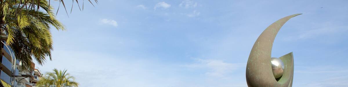 Lloret de Mar Beach featuring street scenes, general coastal views and outdoor art