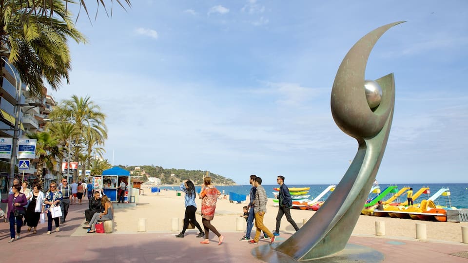 Lloret de Mar Beach which includes street scenes, general coastal views and outdoor art