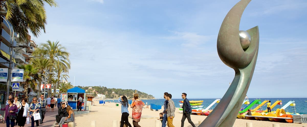 Lloret de Mar Beach featuring street scenes, general coastal views and outdoor art