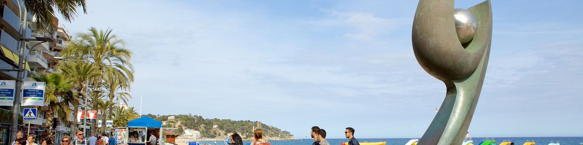 Lloret de Mar Beach which includes street scenes, general coastal views and outdoor art