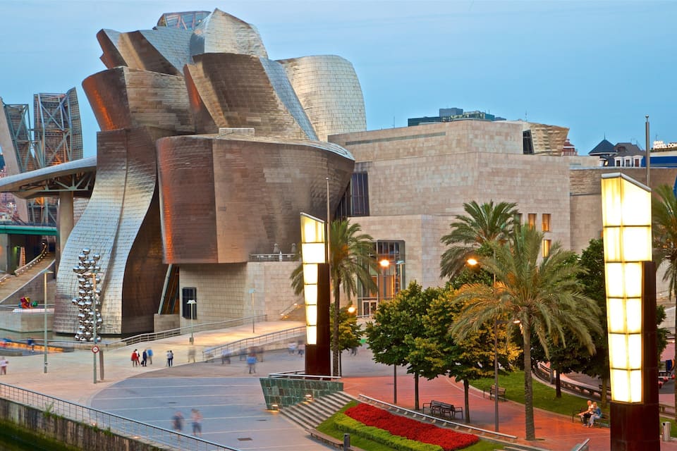 A modern architectural building with a unique, curved design.