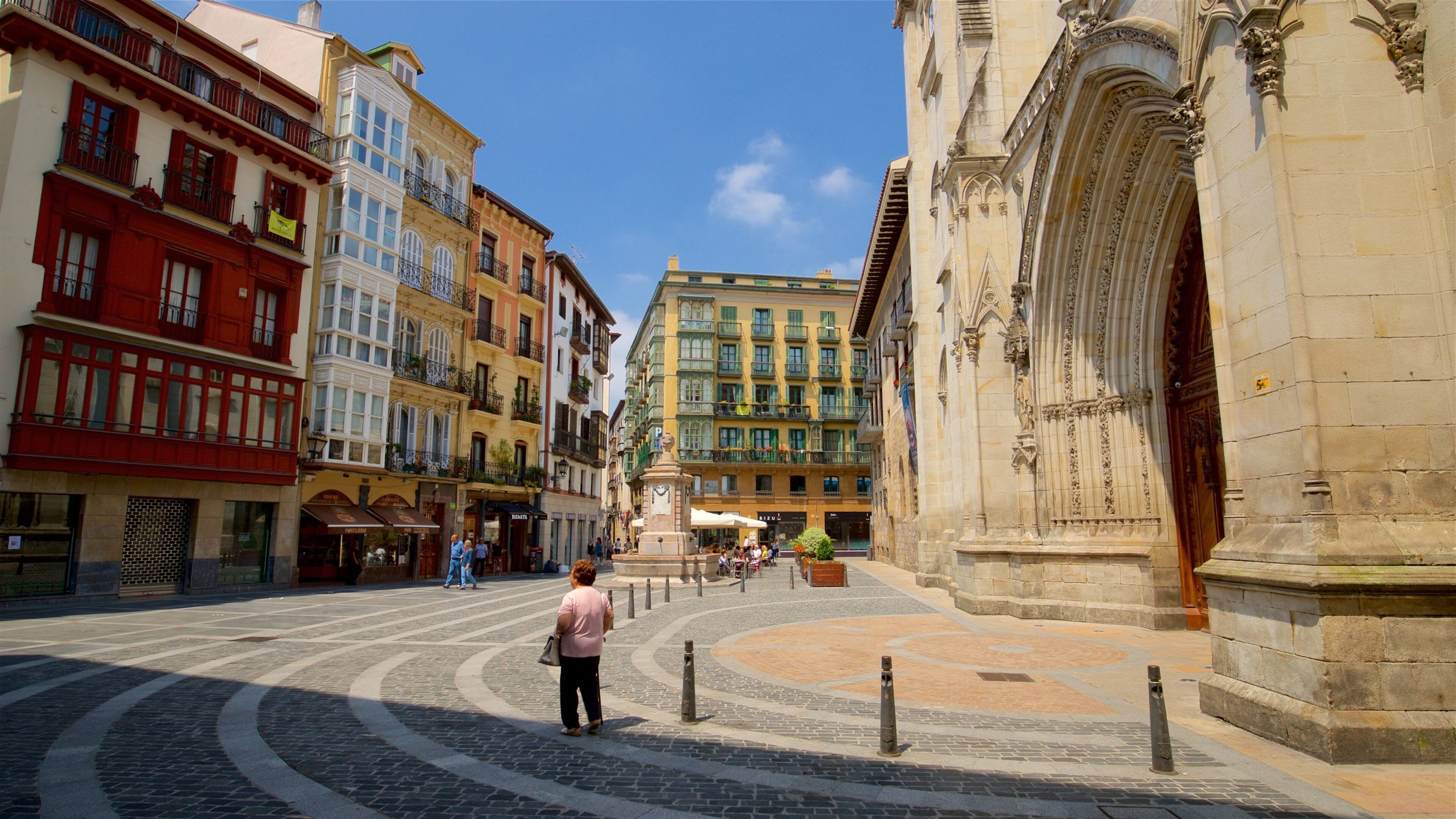 Santiago Cathedral which includes heritage elements and street scenes as well as an individual female