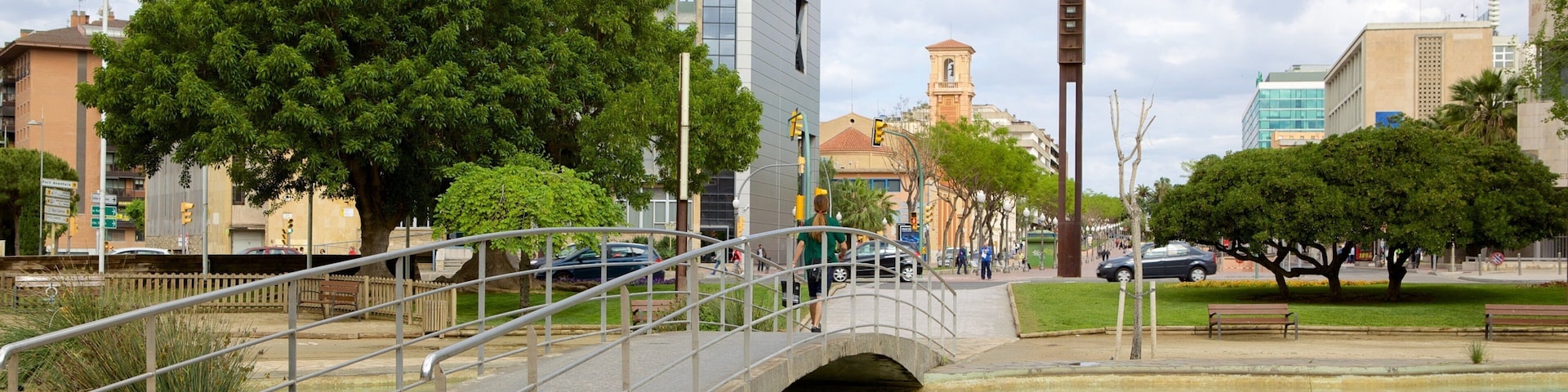 Plaza Imperial Tarraco featuring a park and a bridge