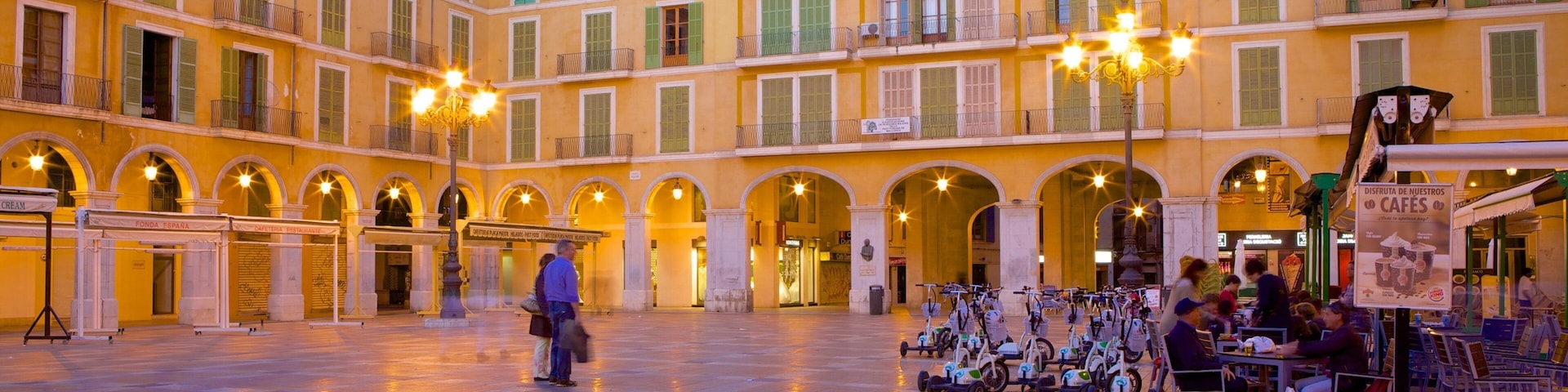 Plaza Mayor de Palma featuring cafe lifestyle, heritage architecture and a square or plaza