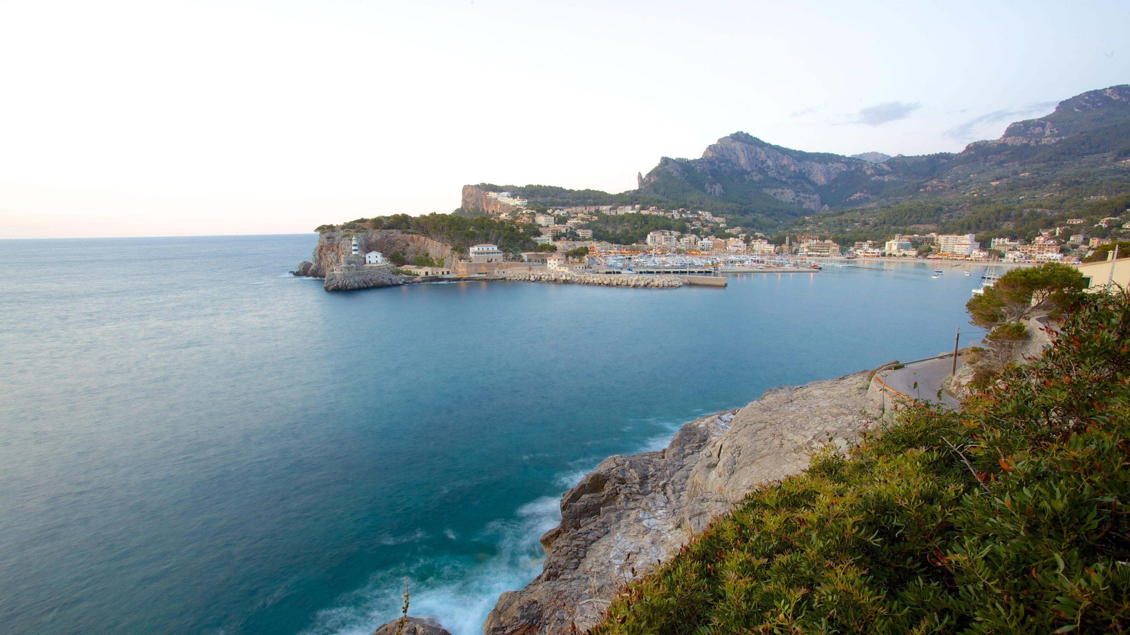 Port de Soller Lighthouse showing a coastal town and general coastal views