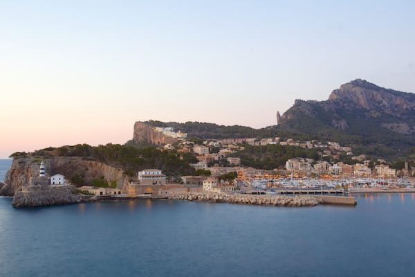Port de Soller Lighthouse which includes general coastal views, a coastal town and a bay or harbour