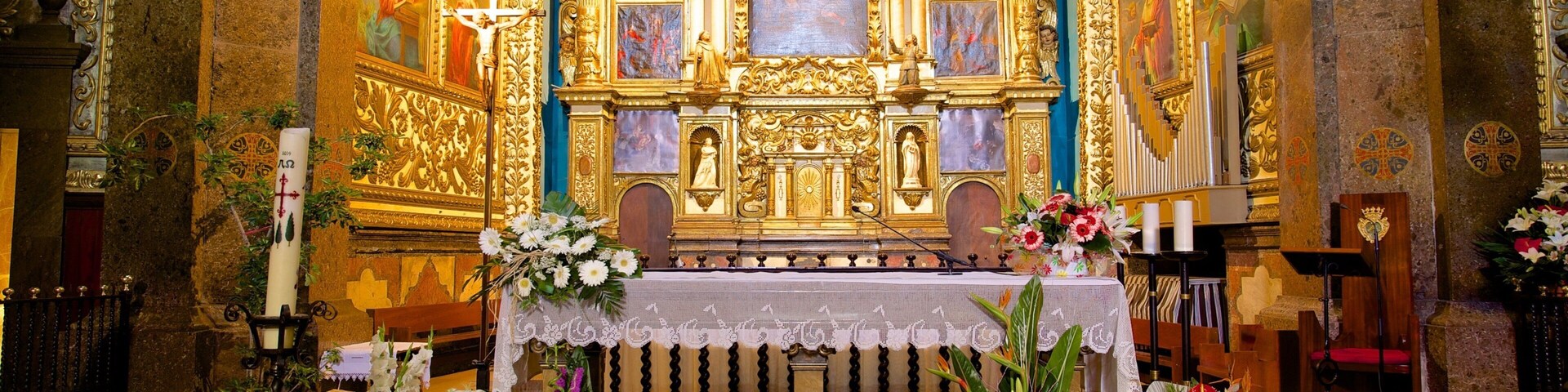 Lluc Monastery featuring religious elements, heritage architecture and interior views