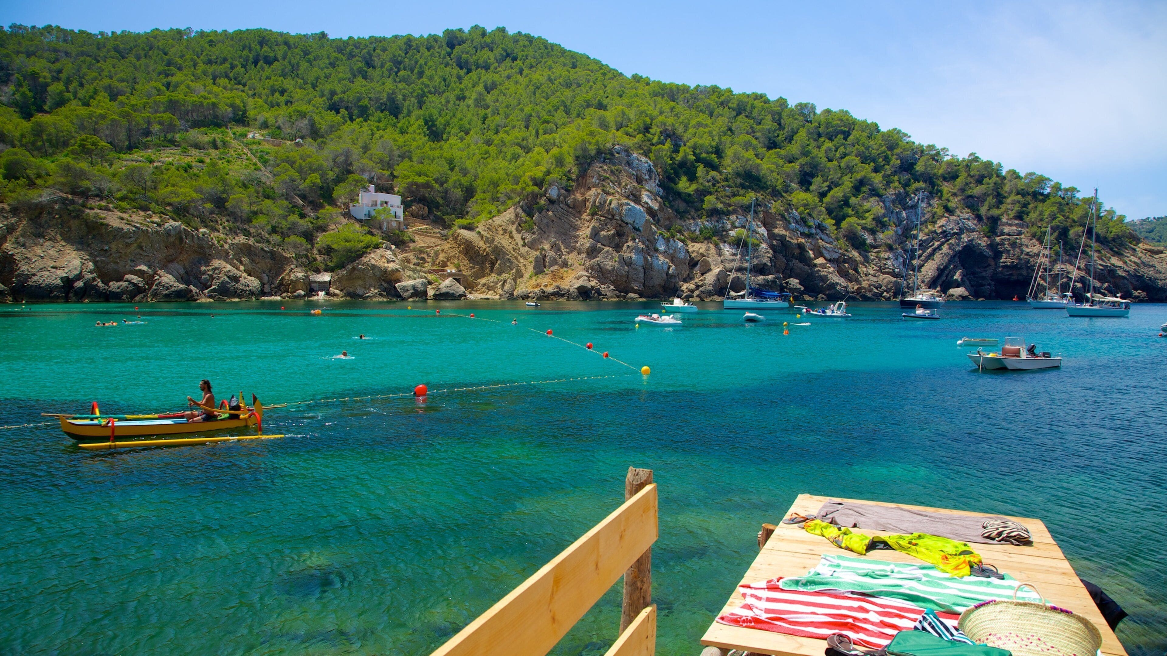 Benirras Beach featuring boating, landscape views and a bay or harbor