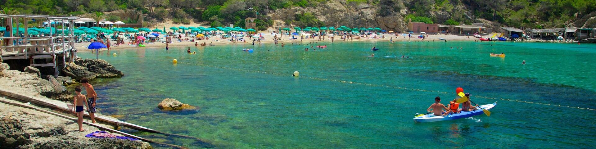 Benirras Beach featuring kayaking or canoeing, a pebble beach and coral