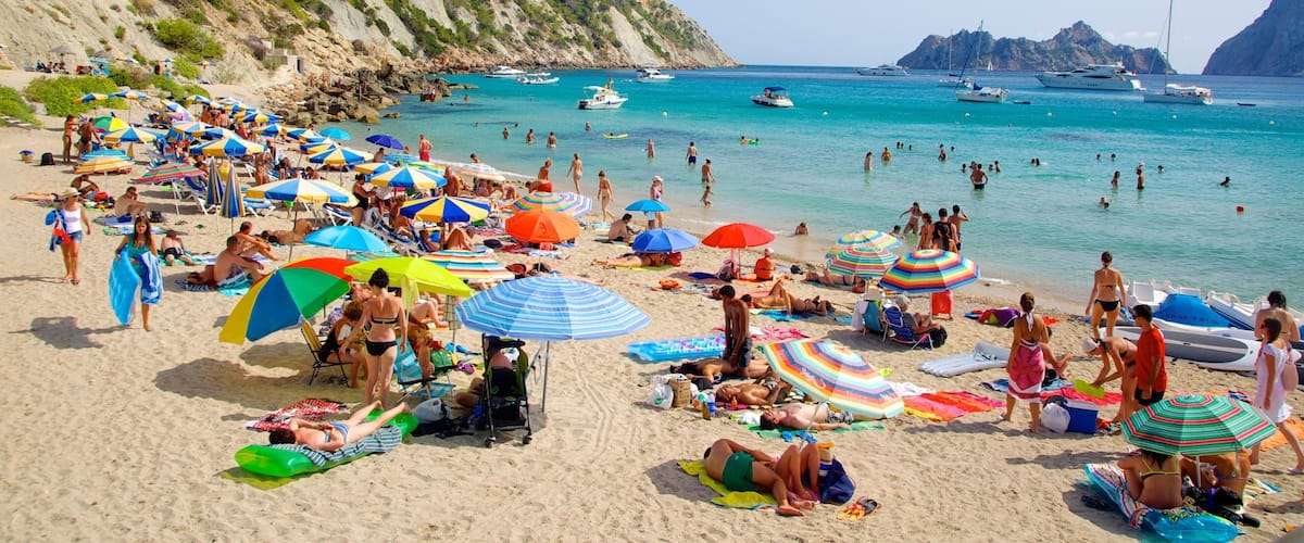 Cala d\'Hort Beach which includes swimming, a beach and boating