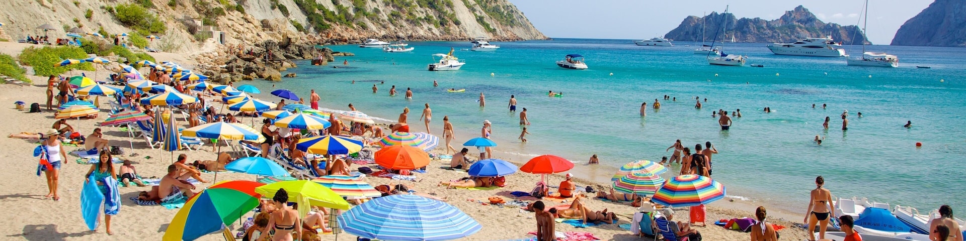 Cala d\'Hort Beach which includes a sandy beach, boating and swimming