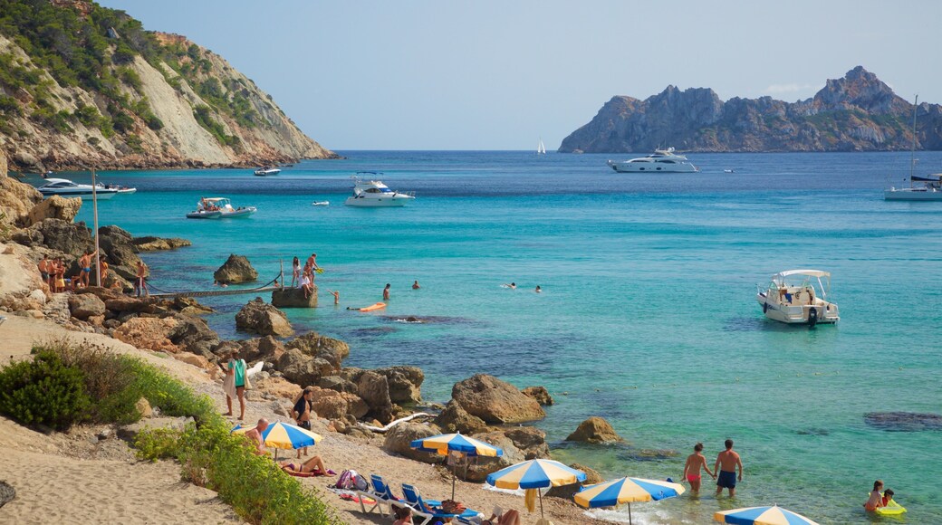 Cala d\'Hort Beach featuring rugged coastline, general coastal views and a sandy beach