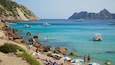 Cala d\'Hort Beach featuring rugged coastline, general coastal views and a sandy beach