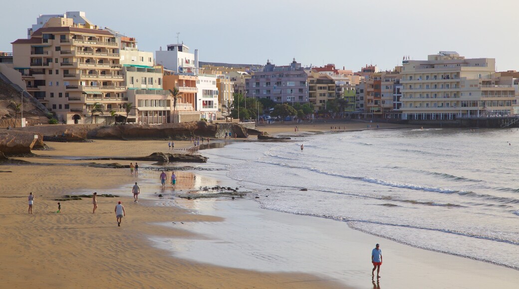 El Medano Beach which includes general coastal views, a coastal town and a sandy beach