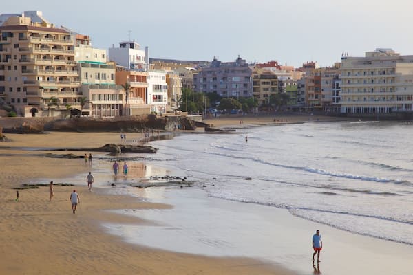 El Medano Beach which includes a beach, a coastal town and general coastal views