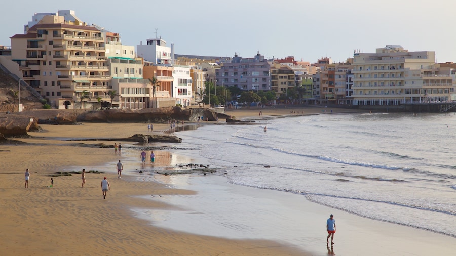 El Medano Beach which includes a beach, a coastal town and general coastal views