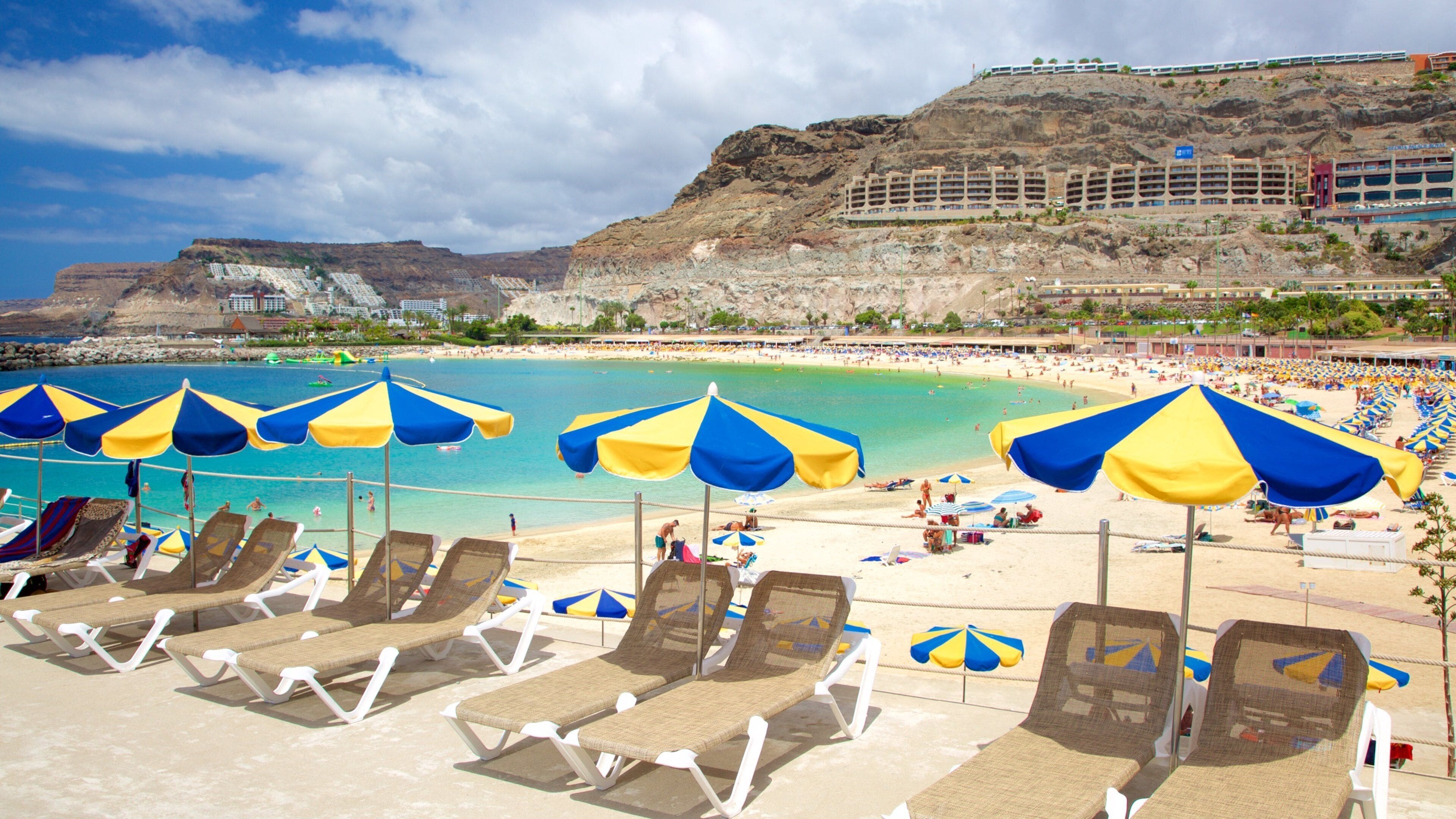 Amadores Beach showing general coastal views, a sandy beach and a luxury hotel or resort