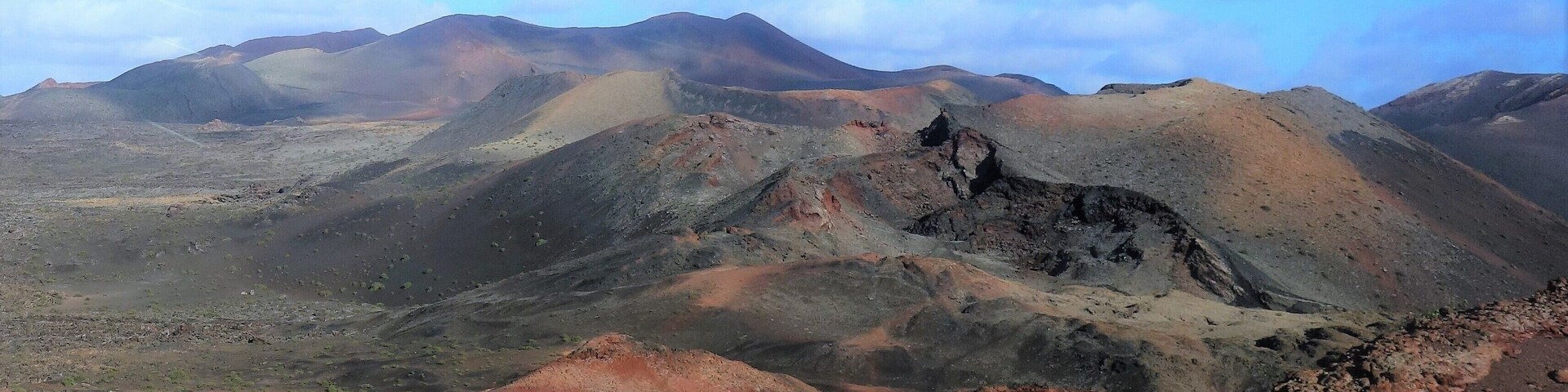âLas Montañas del Fuegoâ are like a walk on the Moon (or Mars) on earth. They originated after the violent volcanic eruptions in the south of Lanzarote between 1730 and 1736, resulting in the Parque Nacional de Timanfaya. The âMountains of Fireâ have a deserted beauty, and a range of ochre shades that astound all visitors. #ReDiscover #Trovember