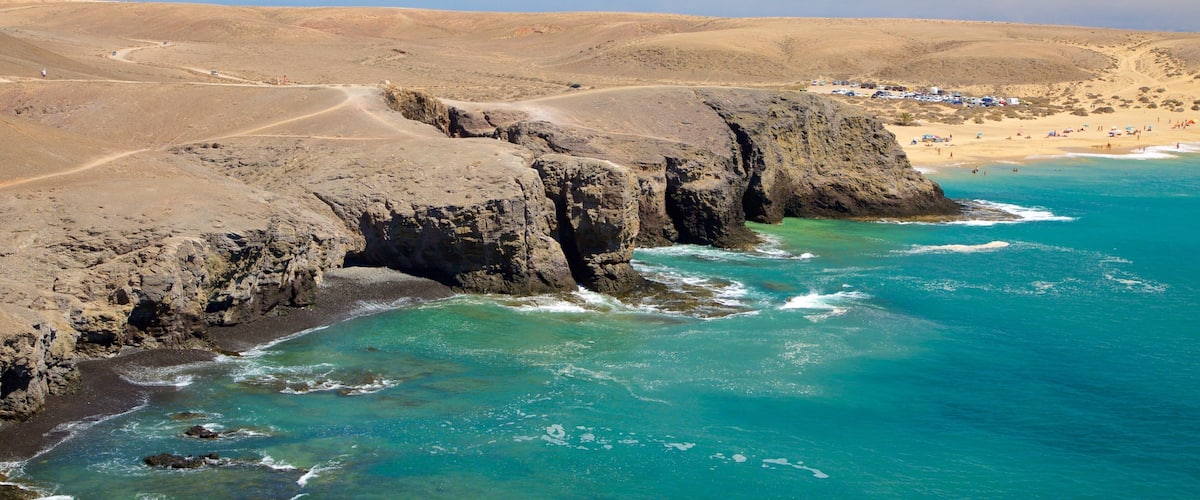 Spiaggia Papagayo che include costa rocciosa, paesaggi rilassanti e vista della costa