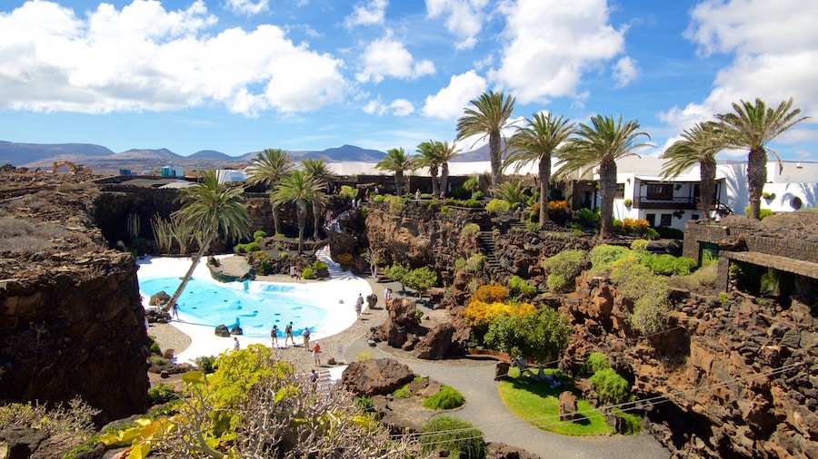 Jameos del Agua showing a pool, a luxury hotel or resort and tropical scenes