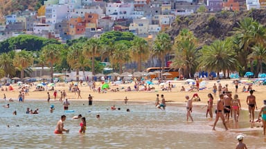 Teresitas Beach which includes swimming, general coastal views and a sandy beach