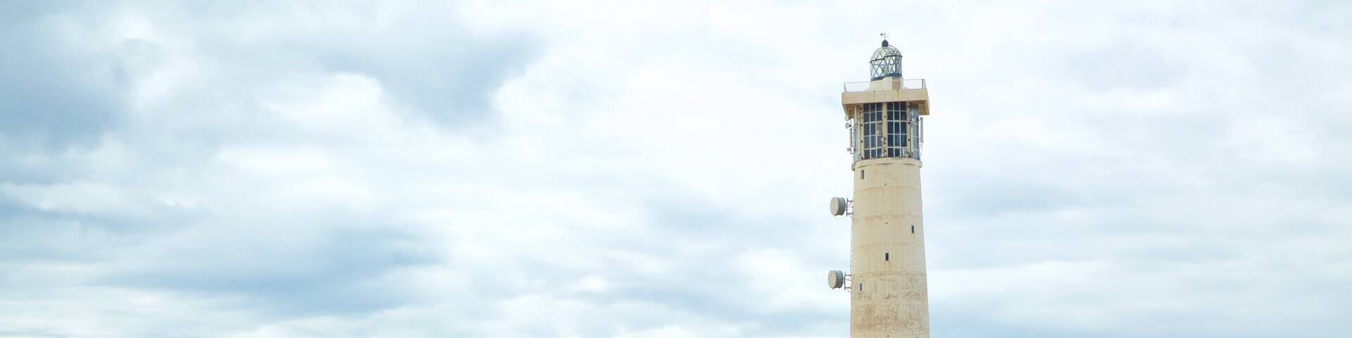 Jandia Lighthouse featuring a lighthouse and general coastal views