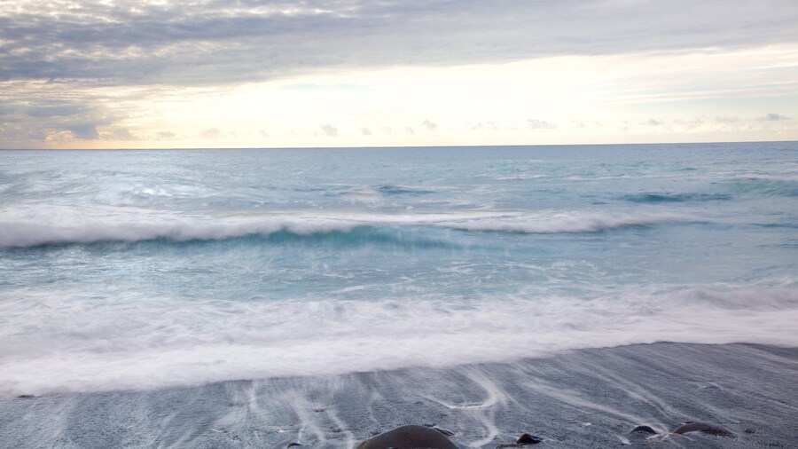 Ajuy Beach showing surf and general coastal views