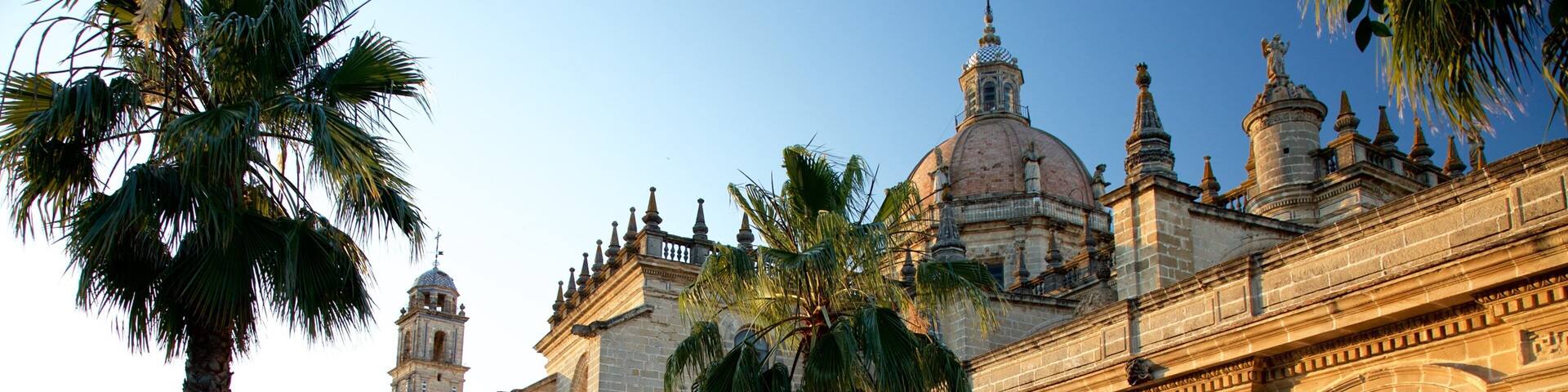 A historic building with ornate architecture, including a bell tower and domed roof.