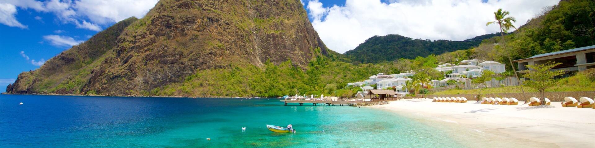 Jalousie Beach which includes mountains, a sandy beach and general coastal views