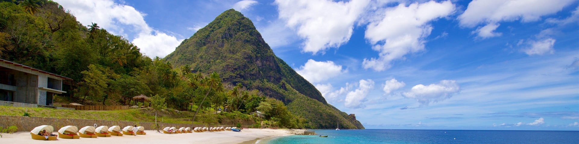 Jalousie Beach which includes mountains, tropical scenes and general coastal views
